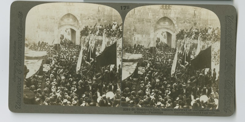 View from outside the city of the Lion&#039;s Gate (St. Stephen&#039;s Gate) in the city wall of Jerusalem with crowds of Muslims leaving the city to visit the resting place of Moses.