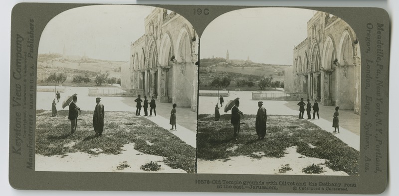 View of the temple grounds with visitors, the Mount of Olives visible in the background.