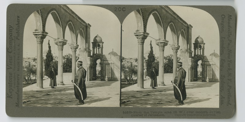 A view of the Jewish quarter of Jerusalem as seen through the archways on the temple grounds.