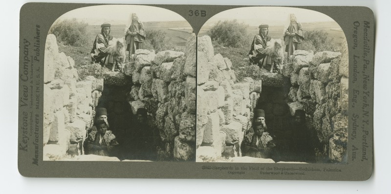 Shepherds with a sheep in the field where the shepherds were visited by an angel announcing the birth of Jesus.