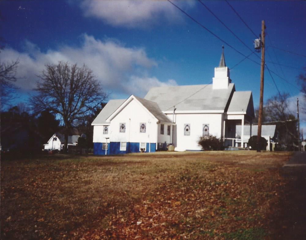 The Lula United Methodist Church building as seen from the left side of the front door.